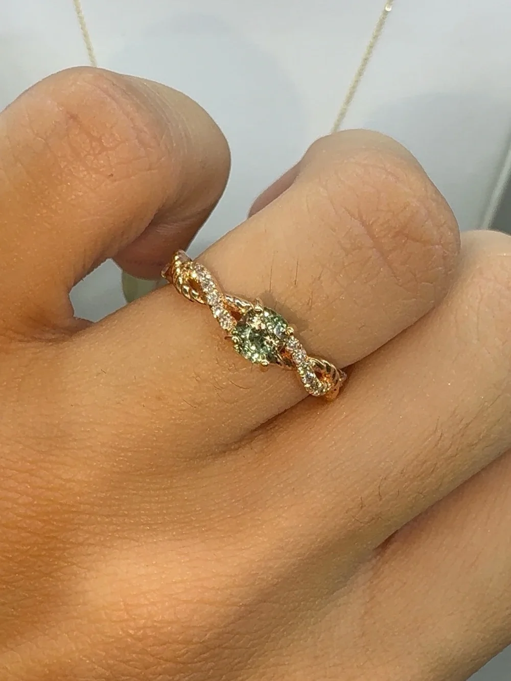14KT ROSE GOLD DIAMOND AND PERIDOT RING